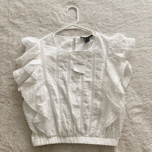 Brand new Forever 21 white cropped blouse with ruffle sleeves and elastic detail